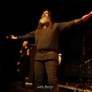 photo_2026-02-13-Vansind (Daverlo) Vansind frontman J Asgaard with arms spread wide toward the audience during a concert