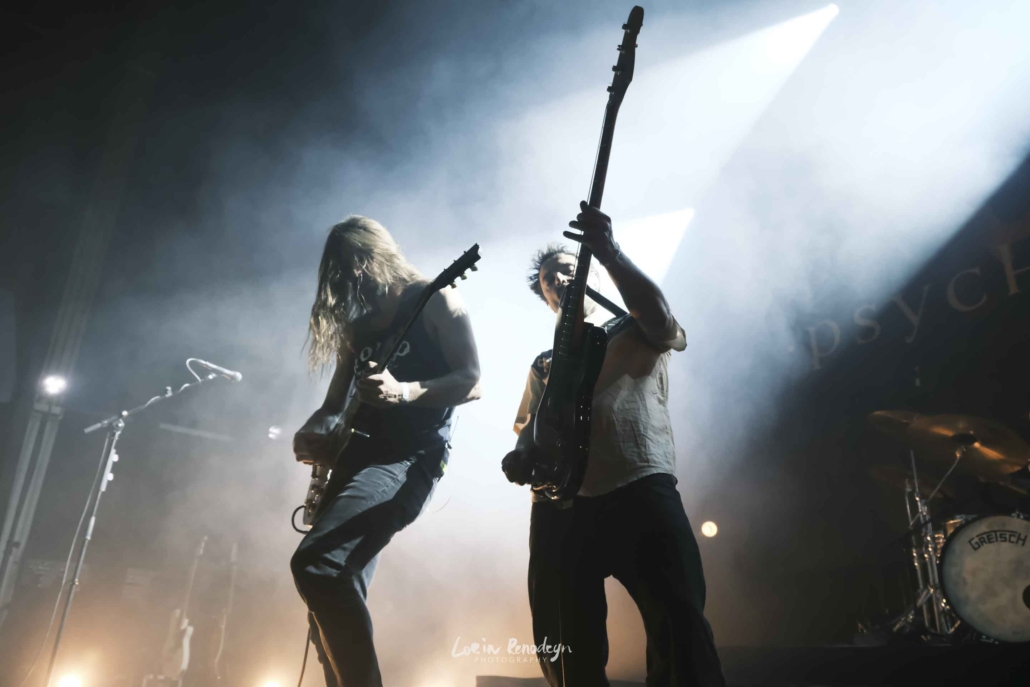 The guitar and bass players of Psychonaut together on stage during a live concert